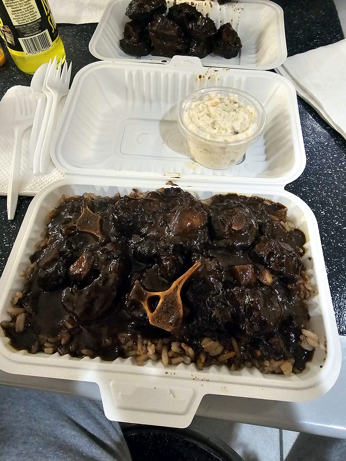 Oxtail on rice and peas