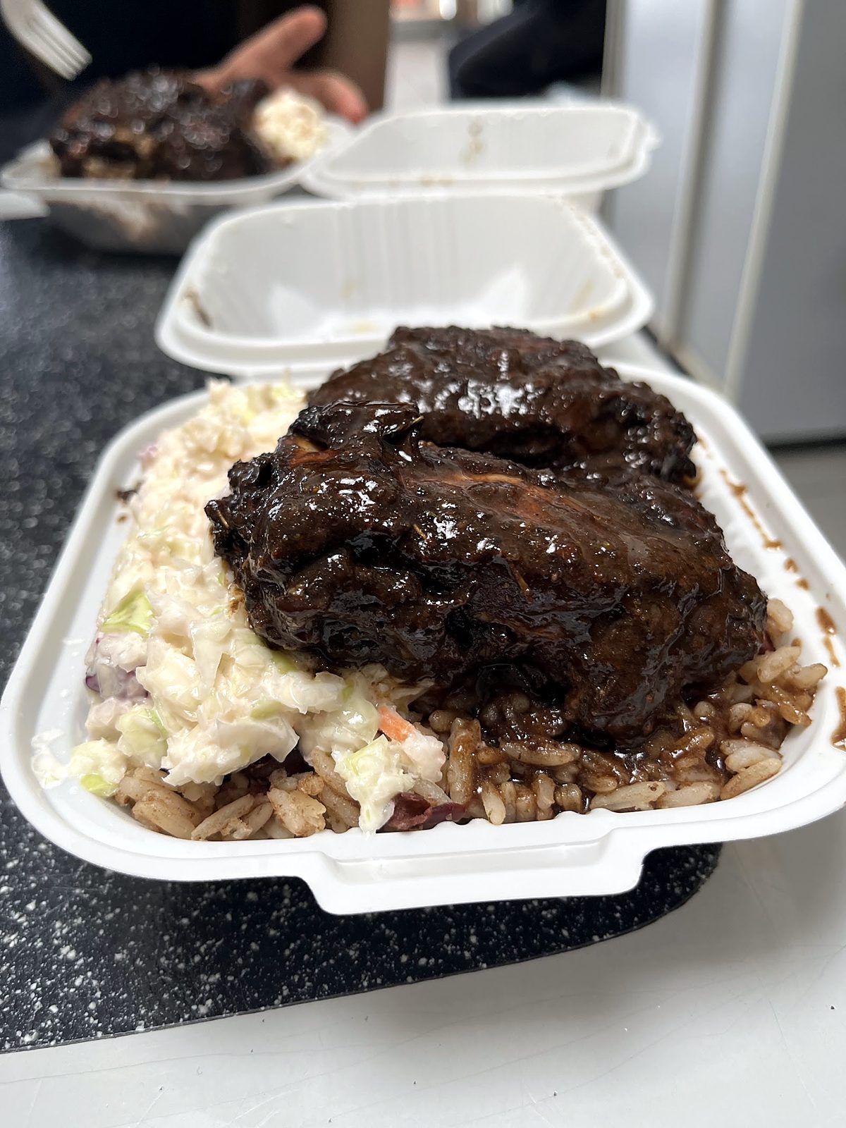 Jerk chicken takeout box